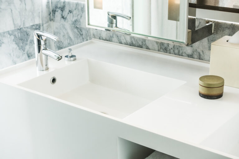 Modern white bathtub in an elegant bathroom, accessible bathroom design