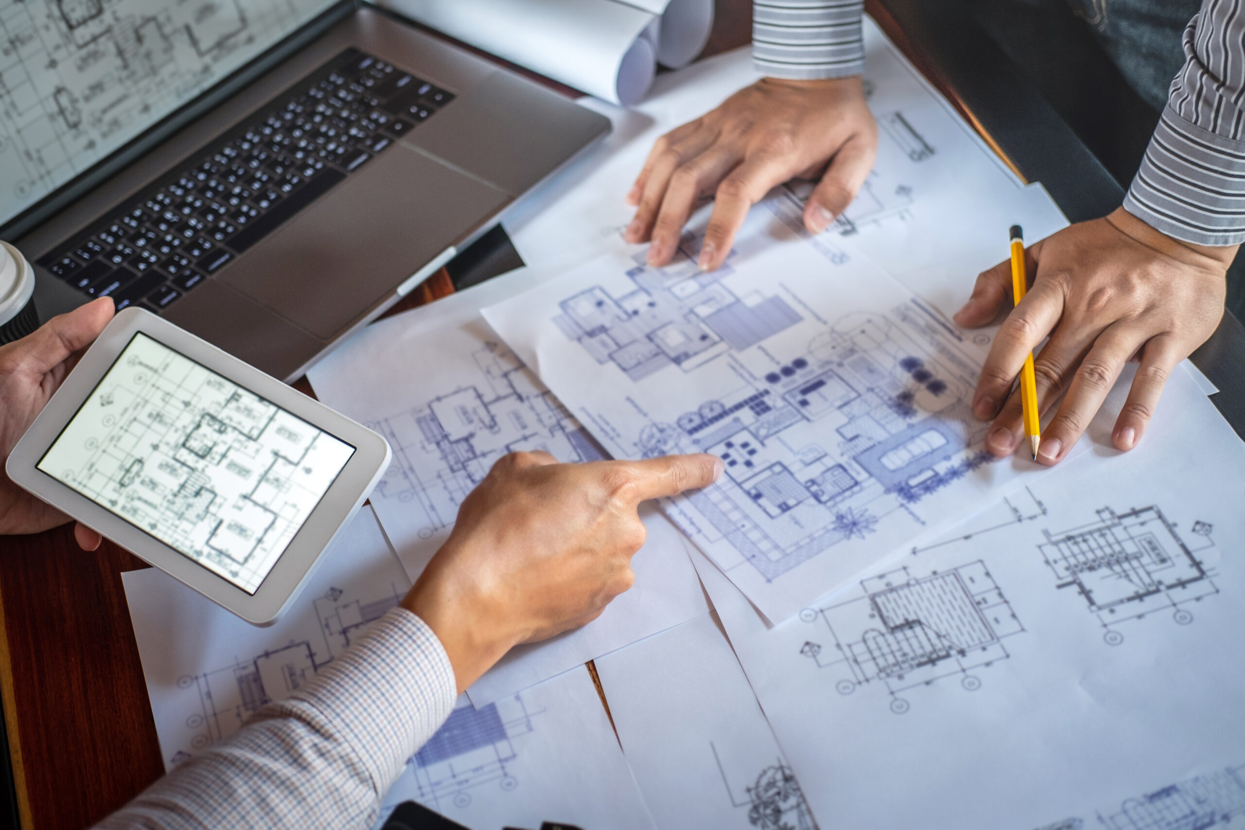 Smart Homes That Support Longevity 1 Person using a tablet during home design planning, technology in interior design