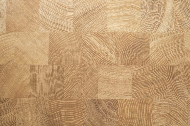 Light oak end-grain parquet flooring, a warm low-glare floor surface for aging in place