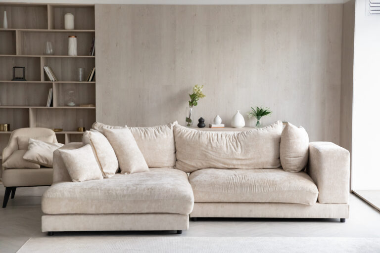 Modern white sofa in an open living room, comfortable aging in place living