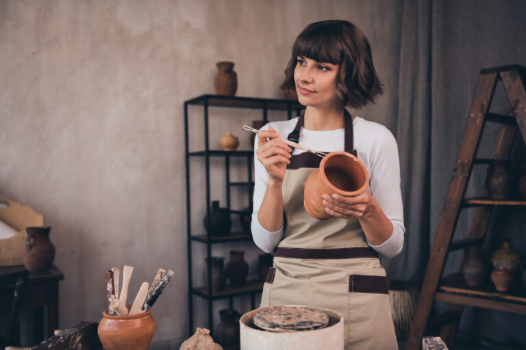 Woman cooking in the kitchen, maintaining independence at home while aging