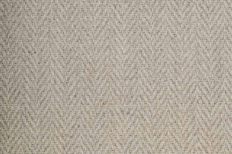 Beige herringbone flat-weave rug texture, close up